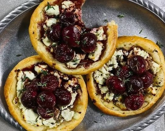 Easy Honey Glazed Goat Cheese Tarts With Edible Pansies top view
